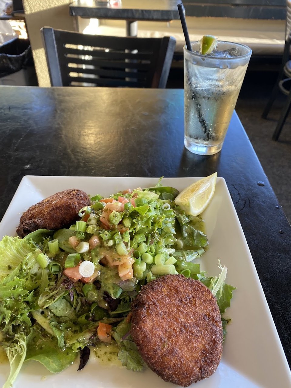 Printed menu with fish and chips.